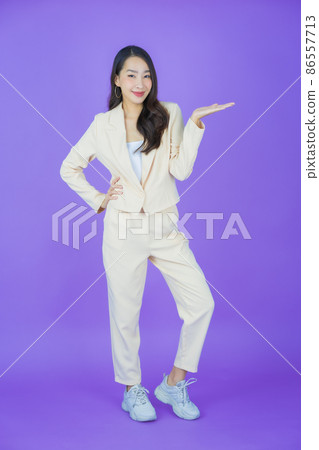 Portrait beautiful young asian woman smile with action 86557713