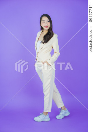 Portrait beautiful young asian woman smile with action Portrait beautiful young asian woman smile with action 86557714