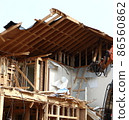 Demolition work site demolition vacant lot real estate housing rebuilding demolition work site heavy machinery construction work chipping 86560862