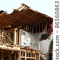 Demolition work site demolition vacant lot real estate housing rebuilding demolition work site heavy machinery construction work chipping 86560863