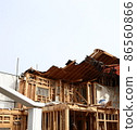Demolition work site demolition vacant lot real estate housing rebuilding demolition work site heavy machinery construction work chipping 86560866