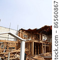 Demolition work site demolition vacant lot real estate housing rebuilding demolition work site heavy machinery construction work chipping 86560867