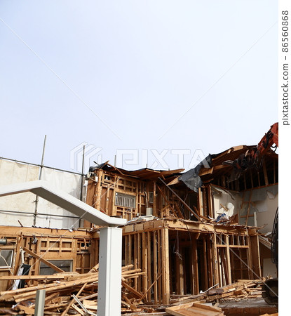 Demolition work site demolition vacant lot real estate housing rebuilding demolition work site heavy machinery construction work chipping 86560868
