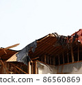 Demolition work site demolition vacant lot real estate housing rebuilding demolition work site heavy machinery construction work chipping 86560869