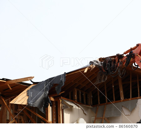 Demolition work site demolition vacant lot real estate housing rebuilding demolition work site heavy machinery construction work chipping 86560870