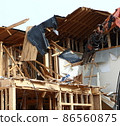 Demolition work site demolition vacant lot real estate housing rebuilding demolition work site heavy machinery construction work chipping 86560875