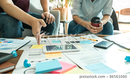 Business partner professional team working together meeting are consultation and analyzing data with new marketing startup project strategy in office 86561080