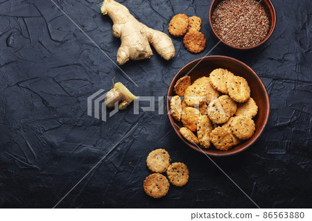 Crackers with flax and ginger ,space for text Crackers with flax and ginger ,space for text 86563880