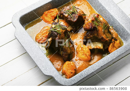 Beef ribs in apricots Beef ribs in apricots 86563908