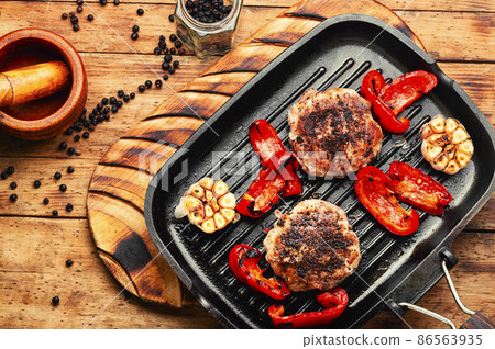 Fried beefsteak in bacon 86563935