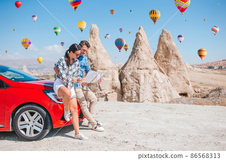 Happy man on summer vacation in famous place. Cave formations. Happy man on summer vacation in famous place. Cave formations. 86568313