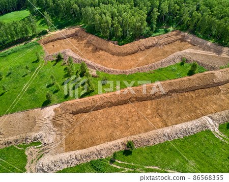 Overburden removal during sand pit preparation, aerial view Overburden removal during sand pit preparation, aerial view 86568355