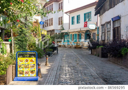 ancient tourist streets with hotels and restaurants in the historic center of Antalya, Turkey 86569295