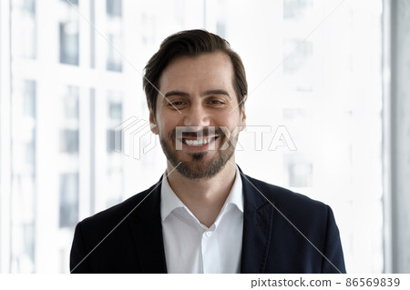 Happy smiling millennial businessman in formal wear head shot portrait 86569839