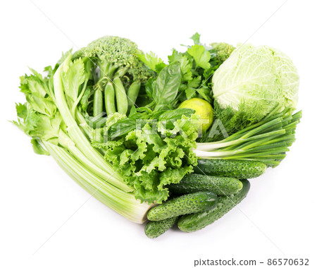 heart shape form by vegetables isolated on the white background. heart shape form by vegetables isolated on the white background. 86570632
