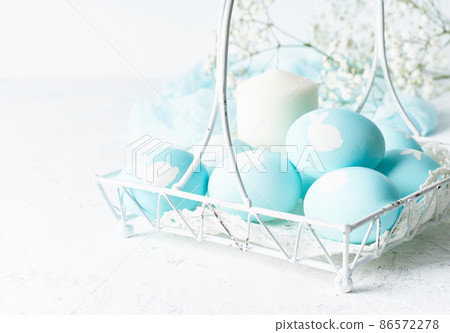 Easter. Holiday. Light white background, gentle pastel colors, side view, copy space Easter. Holiday. Light white background, gentle pastel colors, side view, copy space 86572278
