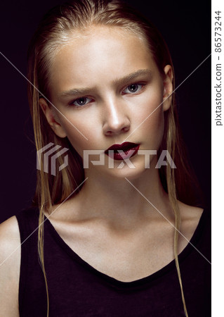 fashion model is posing in studio for test photo shoot showing different poses 86573244