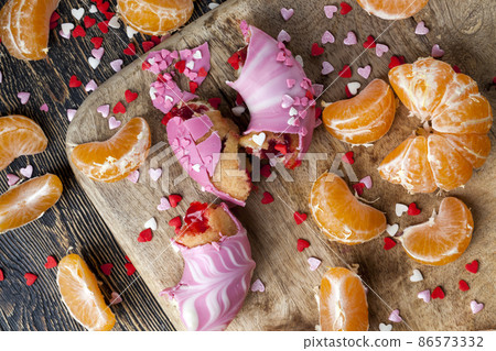 doughnuts with berry filling and chocolate doughnuts with berry filling and chocolate 86573332