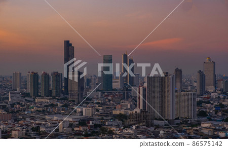 view of Bangkok City skyline twilight time, the business district of Bangkok the Capital of Thailand view of Bangkok City skyline twilight time, the business district of Bangkok the Capital of Thailand 86575142