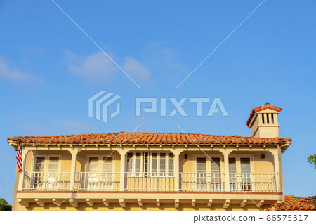 Terrace of a mediterranean style house with US flag at La Jolla, California Terrace of a mediterranean style house with US flag at La Jolla, California 86575317