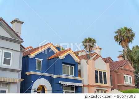 Colorful mediterranean houses in a low angle view at Oceanside, California Colorful mediterranean houses in a low angle view at Oceanside, California 86577398