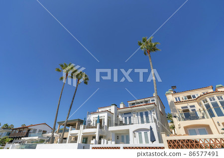 Mediterranean style beach house rentals in a low angle view at La Jolla, California 86577491