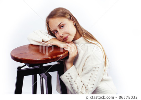 young pretty blond teenage girl emotional posing, happy smiling isolated on white background, lifestyle people concept young pretty blond teenage girl emotional posing, happy smiling isolated on white background, lifestyle people concept 86578032