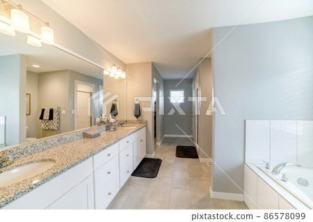 Master bathroom interior with rooms, light gray walls and marble flooring 86578099