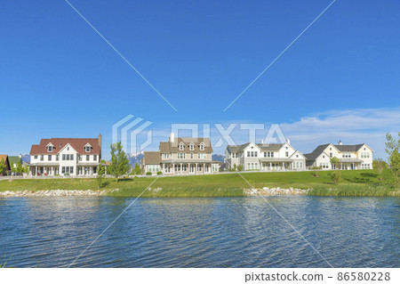 Oquirrh Lake waterfront at Daybreak, Utah residential area 86580228
