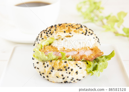 Delicious shrimp cutlet sandwich and hot coffee Delicious shrimp cutlet sandwich and hot coffee 86581528