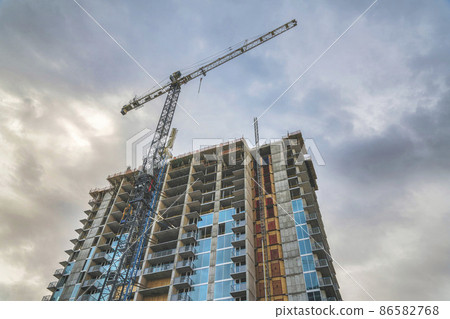 Low angle view of an unfinished building with tower cranes at Salt Lake City in Utah Low angle view of an unfinished building with tower cranes at Salt Lake City in Utah 86582768