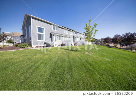 Field outside the residential townhouse building at Utah Valley Field outside the residential townhouse building at Utah Valley 86583209