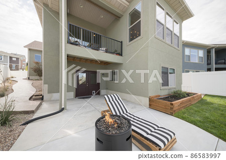 Modern light green two-storey house exterior with terrace Modern light green two-storey house exterior with terrace 86583997