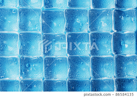 Background of ice cubes with drops in blue color in full screen Background of ice cubes with drops in blue color in full screen 86584135
