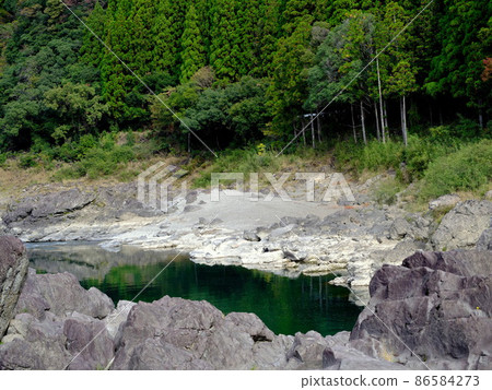 Clear stream Naga River water surface and forest 86584273