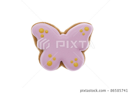 Sweet gingerbread cookies decorated with icing in the form of a butterfly. Easter decoration Sweet gingerbread cookies decorated with icing in the form of a butterfly. Easter decoration 86585741