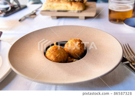 Delicious meal of Spanish fusion cuisine, beautiful dish 86587328