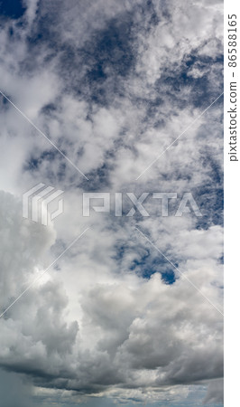 Fantastic clouds against blue sky, panorama 86588165