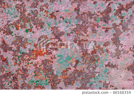 shabby peeled white, orange and green paint layers on concrete surface - flat background and seamless texture 86588359