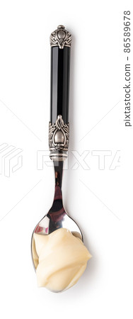 spoon with mayonnaise 86589678