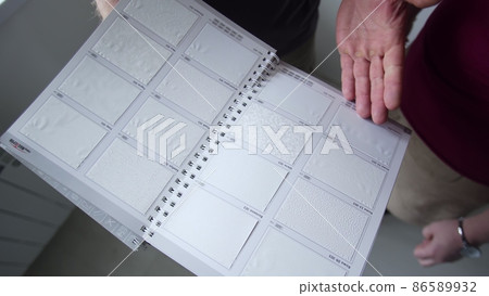 Close-up of texture layout of stretch ceilings. Stretch ceiling, repair 86589932