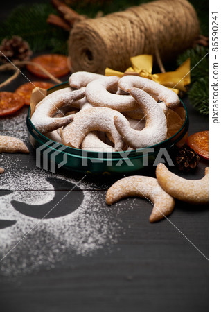 Round Gift box full of Traditional German or Austrian Vanillekipferl vanilla kipferl cookies Round Gift box full of Traditional German or Austrian Vanillekipferl vanilla kipferl cookies 86590241