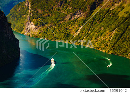 Fjord Geirangerfjord with cruise ship, Norway. 86591042