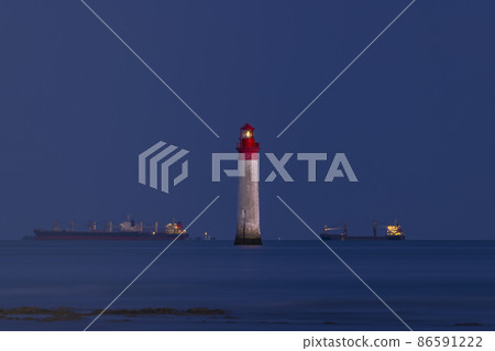 Phare de Chauvea near Ile de Re with ships to La Rochelle, Pays de la Loire, France Phare de Chauvea near Ile de Re with ships to La Rochelle, Pays de la Loire, France 86591222