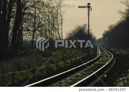 Old mechanical traffic light with rails Old mechanical traffic light with rails 86591397