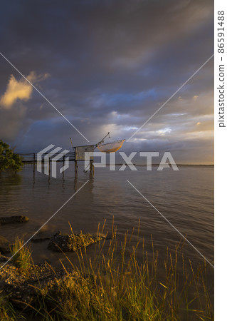 Traditional fishing hut on river Gironde, Bordeaux, Aquitaine, France Traditional fishing hut on river Gironde, Bordeaux, Aquitaine, France 86591488