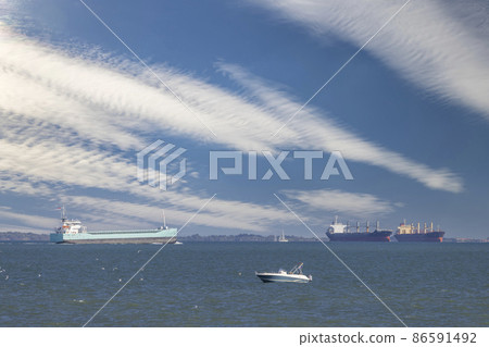 Phare de Chauvea near Ile de Re with ships to La Rochelle, Pays de la Loire, France Phare de Chauvea near Ile de Re with ships to La Rochelle, Pays de la Loire, France 86591492