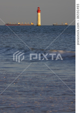 Phare de Chauvea near Ile de Re with ships to La Rochelle, Pays de la Loire, France Phare de Chauvea near Ile de Re with ships to La Rochelle, Pays de la Loire, France 86591493