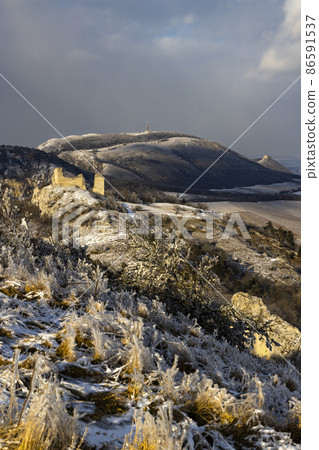 Palava winter landscape with Sirotci hradek ruins, Southern Moravia, Czech Republic Palava winter landscape with Sirotci hradek ruins, Southern Moravia, Czech Republic 86591537