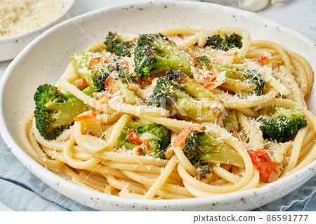 Spaghetti pasta with broccoli, bucatini with pine nuts. Food for vegans, vegetarians Spaghetti pasta with broccoli, bucatini with pine nuts. Food for vegans, vegetarians 86591777